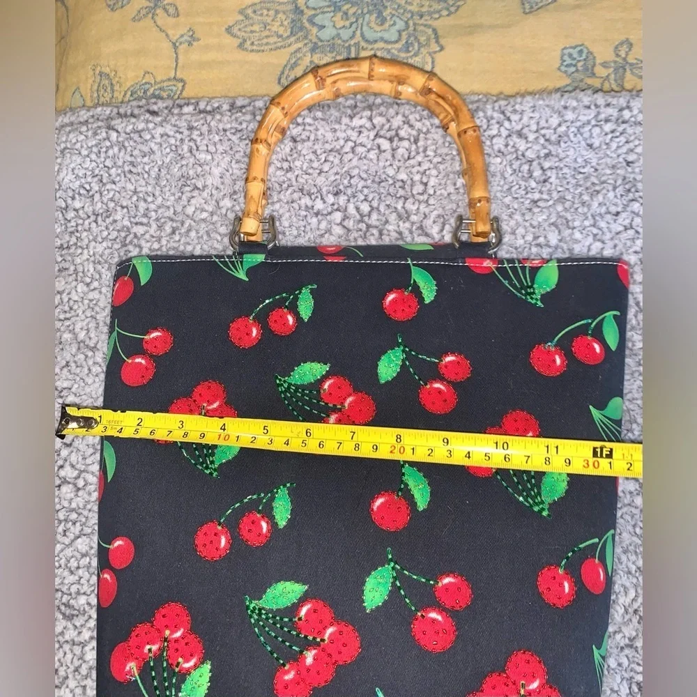 Black purse with red cherries and bamboo handles large